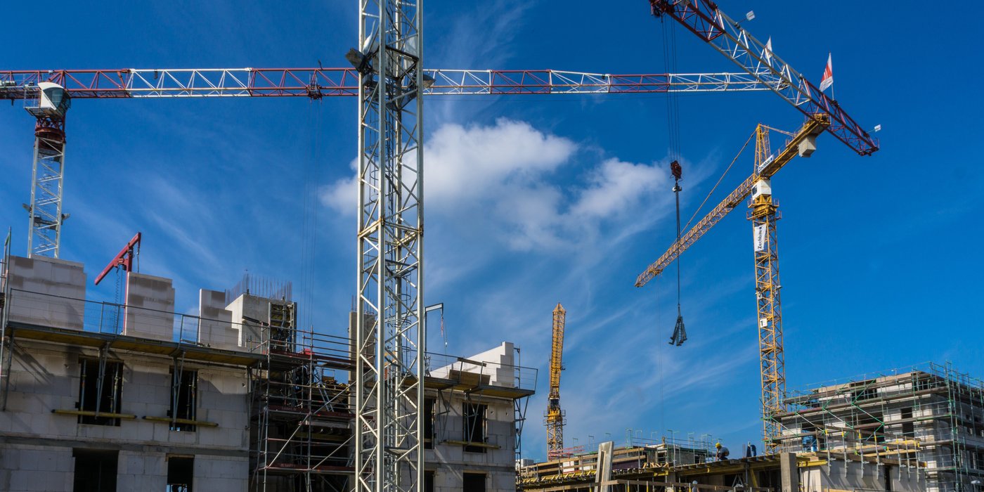 Active construction site with cranes